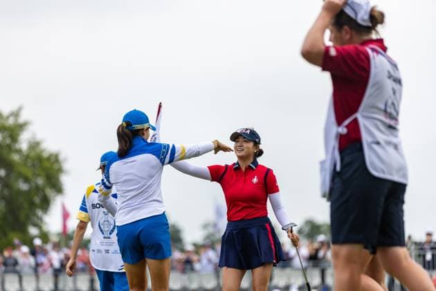 September 13, 2024, Gainesville, Va, USA: Team USA s ROSE ZHANG hugs a European player after winning her match during day one of the 2024 Solheim Cup at the Robert Trent Jones Golf Club. Gainesville USA - ZUMAb237 20240913_znp_b237_012 Copyright: xRobertxBlakleyx
