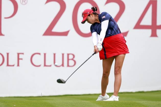 GAINESVILLE, VA - SEPTEMBER 13: USA golfer Rose Zhang plays her tee shot on the first hole during the Friday Four-Ball of the first round of the 2024 Solheim Cup on September 13, 2024, at Robert Trent Jones Golf Club at Gainesville, Virginia. (Photo by Brian Spurlock Icon Sportswire) GOLF: SEP 13 Solheim Cup EDITORIAL USE ONLY Icon24091391