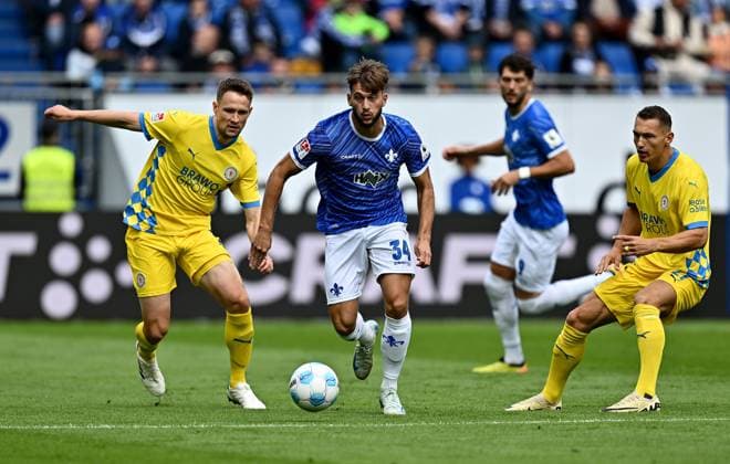 14 09 2024, xfux, Soccer 2 Bundesliga, SV Darmstadt 98 Eintracht Braunschweig, v l Jannis Nikolaou Eintracht Braunschweig , Killian Corredor SV Darmstadt 98 , Kevin Ehlers Eintracht Braunschweig DFL DFB REGULATIONS PROHIBIT ANY USE OF PHOTOGRAPHS as IMAGE SEQUENCES and or QUASI VIDEO Licensing of the photographic work to and or by SV Darmstadt 1898 e V and subsidiaries is not permitted No release of or sale to SV Darmstadt 1898 e V Darmstadt