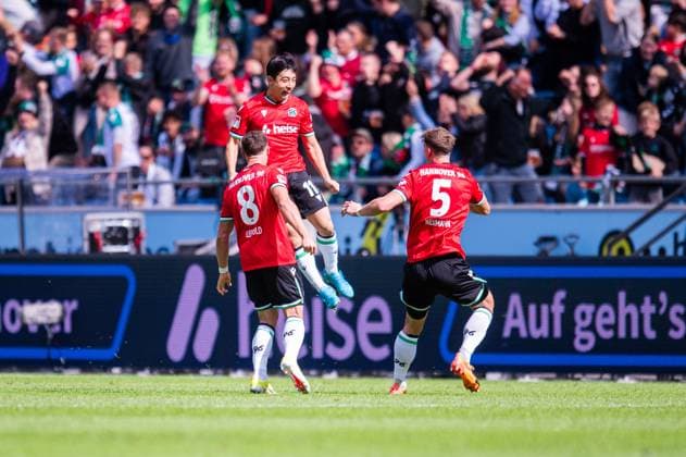 14 09 2024 Soccer, 2024 2025, 2 Bundesliga, Matchday 5, Hannover 96 1 FC Kaiserslautern M Hyun ju Lee Hannover celebrates after his goal to 1 0 with L Enzo Leopold Hannover , R Phil Neumann Hannover DFL REGULATIONS PROHIBIT ANY USE OF PHOTOGRAPHS AS IMAGE SEQUENCES AND OR QUASI VIDEO
