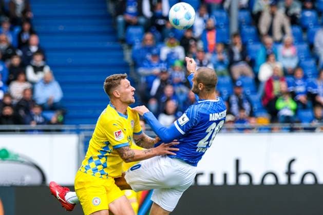 Sebastian Polter Eintracht Braunschweig, 17 in duel with Aleksandar Vukotic SV Darmstadt 98, 20 , GER, SV Darmstadt 98 vs Eintracht Braunschweig, Soccer, 2 Bundesliga, Matchday 5, Season 2024 2025, 14 09 2024 DFL DFB REGULATIONS PROHIBIT ANY USE OF PHOTOGRAPHS as IMAGE SEQUENCES and or QUASI VIDEO GER, SV Darmstadt 98 vs Eintracht Braunschweig, Football, 2 Bundesliga, Matchday 5, Season 2024 2025, 14 09 2024 Darmstadt Copyright: xEibner-Pressefoto FlorianxWieganx EP_FWD