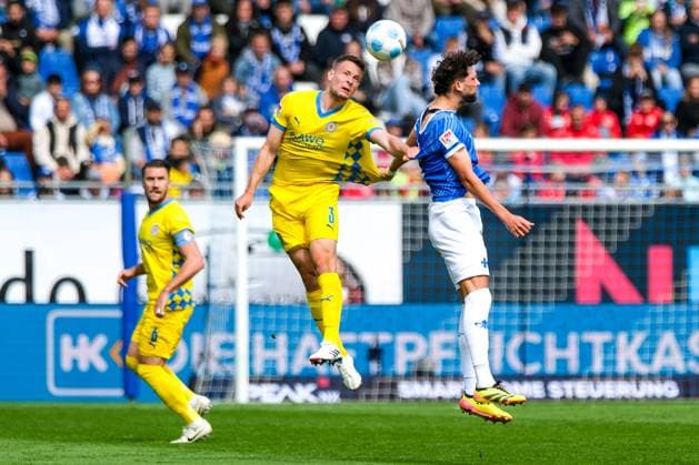 Paul Jaeckel Eintracht Braunschweig, 03 in duel with Fraser Hornby SV Darmstadt 98, 09 , GER, SV Darmstadt 98 vs Eintracht Braunschweig, Soccer, 2 Bundesliga, Matchday 5, Season 2024 2025, 14 09 2024 DFL DFB REGULATIONS PROHIBIT ANY USE OF PHOTOGRAPHS as IMAGE SEQUENCES and or QUASI VIDEO GER, SV Darmstadt 98 vs Eintracht Braunschweig, Football, 2 Bundesliga, Matchday 5, Season 2024 2025, 14 09 2024 Darmstadt Copyright: xEibner-Pressefoto FlorianxWieganx EP_FWD