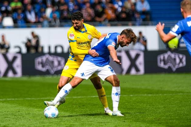 Fabio Kaufmann Eintracht Braunschweig, 07 in duel with Killian Corredor SV Darmstadt 98, 34 , GER, SV Darmstadt 98 vs Eintracht Braunschweig, Soccer, 2 Bundesliga, Matchday 5, Season 2024 2025, 14 09 2024 DFL DFB REGULATIONS PROHIBIT ANY USE OF PHOTOGRAPHS as IMAGE SEQUENCES and or QUASI VIDEO GER, SV Darmstadt 98 vs Eintracht Braunschweig, Football, 2 Bundesliga, Matchday 5, Season 2024 2025, 14 09 2024 Darmstadt Copyright: xEibner-Pressefoto FlorianxWieganx EP_FWD