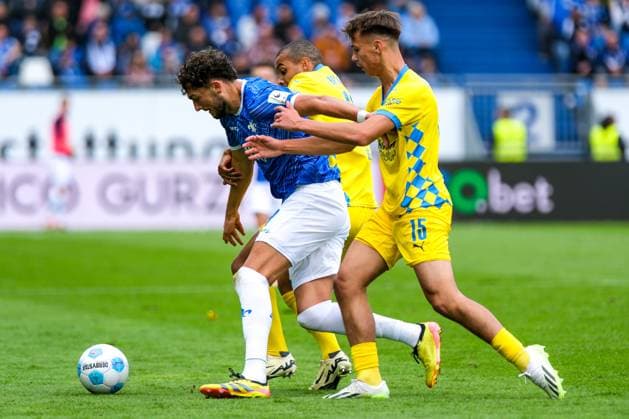 Fraser Hornby SV Darmstadt 98, 09 in action with Max Marie Eintracht Braunschweig, 15 and Leon Bell Bell Eintracht Braunschweig, 19 , GER, SV Darmstadt 98 vs Eintracht Braunschweig, Football, 2 Bundesliga, Matchday 5, Season 2024 2025, 14 09 2024 DFL DFB REGULATIONS PROHIBIT ANY USE OF PHOTOGRAPHS as IMAGE SEQUENCES and or QUASI VIDEO GER, SV Darmstadt 98 vs Eintracht Braunschweig, Football, 2 Bundesliga, Matchday 5, Season 2024 2025, 14 09 2024 Darmstadt Copyright: xEibner-Pressefoto FlorianxWieganx EP_FWD