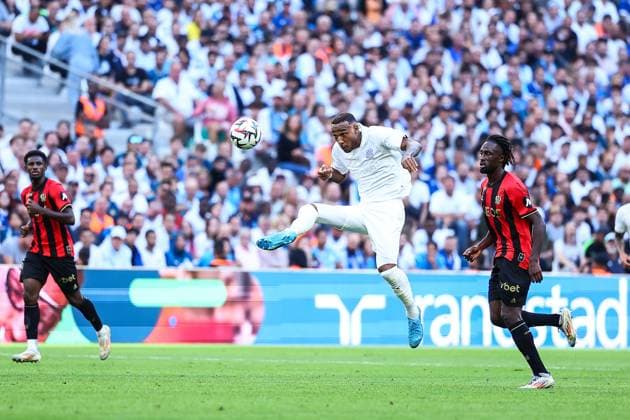 14th September 2024 - LIGUE 1 MCDONALDS - STAGE 4 - SEASON 2024 2025 - OLYMPIQUE DE MARSEILLE vs OGC NICE - ORANGE VELODROME cornelius (derek) in action against guessand (evann) MARSEILLE FRANCE Copyright: xSPORTPIXPRESSx xFREDxPORCUx