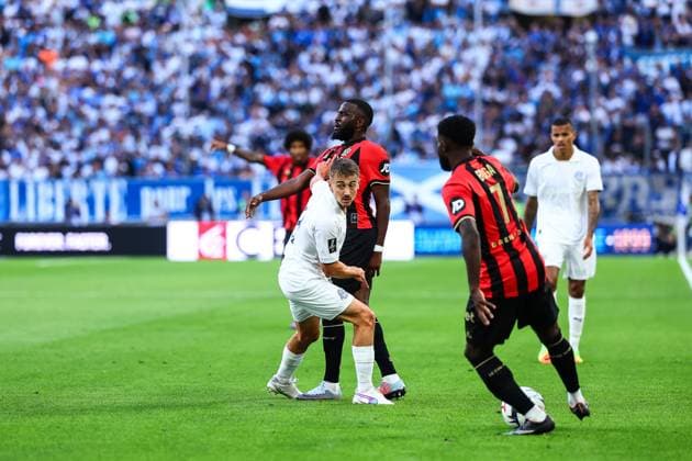 14th September 2024 - LIGUE 1 MCDONALDS - STAGE 4 - SEASON 2024 2025 - OLYMPIQUE DE MARSEILLE vs OGC NICE - ORANGE VELODROME ndombele (tanguy) tackles rongier (valentin) MARSEILLE FRANCE Copyright: xSPORTPIXPRESSx xFREDxPORCUx