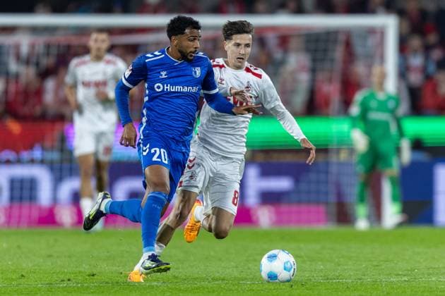 Soccer 2 Bundesliga 5 Matchday 1 FC Köln 1 FC Magdeburg on 14 09 2024 at RheinEnergieStadion in Cologne Xavier Amaechi Magdeburg , left Denis Huseinbasic Köln , right DFB regulations prohibit any use of photographs as image sequences and or quasi video xJRx