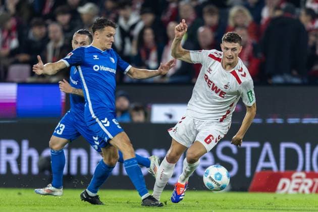 Soccer 2 Bundesliga 5 Matchday 1 FC Köln 1 FC Magdeburg on 14 09 2024 at RheinEnergieStadion in Cologne Martijn Kaars Magdeburg , left Eric Martel Köln , right DFB regulations prohibit any use of photographs as image sequences and or quasi video xJRx