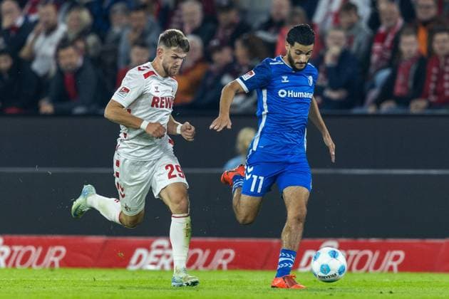 Soccer 2 Bundesliga 5 Matchday 1 FC Köln 1 FC Magdeburg on 14 09 2024 at RheinEnergieStadion in Cologne Jan Thielmann Köln , left Mohammed El Hankouri Magdeburg , right DFB regulations prohibit any use of photographs as image sequences and or quasi video xJRx