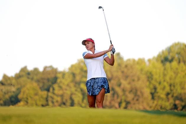 GAINESVILLE, VA - SEPTEMBER 14: Team USA golfer Lexi Thompson hits an iron shot on the first hole during Saturday Foursomes during the 2024 Solheim Cup on September 14, 2024 at Robert Trent Jones Golf Club at Gainesville, Virginia. (Photo by Brian Spurlock Icon Sportswire) GOLF: SEP 14 Solheim Cup EDITORIAL USE ONLY Icon24091442