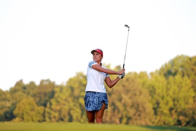 GAINESVILLE, VA - SEPTEMBER 14: Team USA golfer Lexi Thompson hits an iron shot on the first hole during Saturday Foursomes during the 2024 Solheim Cup on September 14, 2024 at Robert Trent Jones Golf Club at Gainesville, Virginia. (Photo by Brian Spurlock Icon Sportswire) GOLF: SEP 14 Solheim Cup EDITORIAL USE ONLY Icon24091443