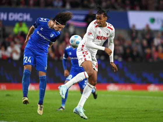 Jean Hugonet 1 FC Magdeburg and Damion Downs 1 FC Koeln battle for the ball during the 2 Bundesliga match between 1 FC Köln and 1 FC Magdeburg at RheinEnergieStadion on September 14, 2024 in Cologne, Germany Germany Photo by Ralf Treese DeFodi Images Jean Hugonet 1 FC Magdeburg and Damion Downs 1 FC Koeln battle for the ball during the 2 Bundesliga match between 1 FC Köln and 1 FC Magdeburg at RheinEnergieStadion on September 14, 2024 in Cologne, Germany Photo by Ralf Treese DeFodi Images DFB DFL REGULATIONS PROHIBIT ANY USE OF PHOTOGRAPHS AS IMAGE SEQUENCES AND OR QUASI VIDEO Defodi 521 KOEFCM20240914 002 Defodi-521 DFB DFL REGULATIONS PROHIBIT ANY USE OF PHOTOGRAPHS AS IMAGE SEQUENCES AND OR QUASI-VIDEO.