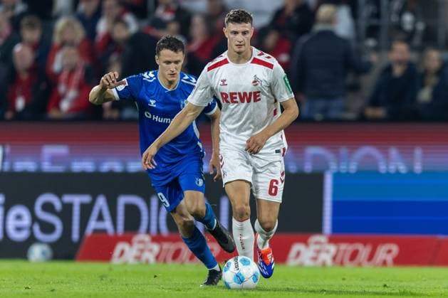 Soccer 2 Bundesliga 5 Matchday 1 FC Köln 1 FC Magdeburg on 14 09 2024 at RheinEnergieStadion in Cologne Martijn Kaars Magdeburg , left Eric Martel Köln , right DFB regulations prohibit any use of photographs as image sequences and or quasi video xJRx