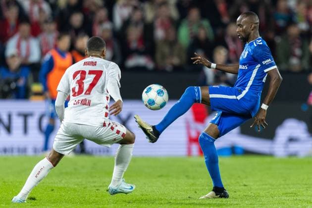 Soccer 2 Bundesliga 5 Matchday 1 FC Köln 1 FC Magdeburg on 14 09 2024 at RheinEnergieStadion in Cologne Linton Maina Köln , left Silas Gnaka Magdeburg , right DFB regulations prohibit any use of photographs as image sequences and or quasi video xJRx