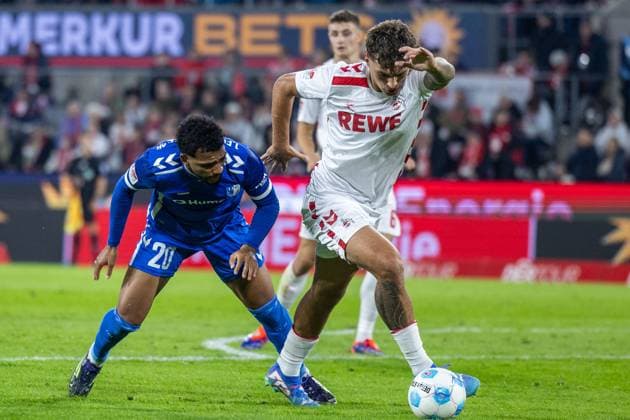Soccer 2 Bundesliga 5 Matchday 1 FC Köln 1 FC Magdeburg on 14 09 2024 at RheinEnergieStadion in Cologne Xavier Amaechi Magdeburg , left Julian Pauli Köln , right DFB regulations prohibit any use of photographs as image sequences and or quasi video xJRx