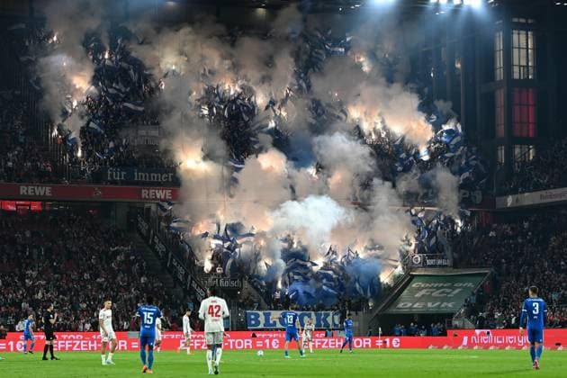 Fans Magdeburg supporters use pyrotechnics during the 2 Bundesliga match between 1 FC Köln and 1 FC Magdeburg at RheinEnergieStadion on September 14, 2024 in Cologne, Germany Photo by Ralf Treese DeFodi Images Fans Magdeburg supporters use pyrotechnics during the 2 Bundesliga match between 1 FC Köln and 1 FC Magdeburg at RheinEnergieStadion on September 14, 2024 in Cologne, Germany Photo by Ralf Treese DeFodi Images DFB DFL REGULATIONS PROHIBIT ANY USE OF PHOTOGRAPHS AS IMAGE SEQUENCES AND OR QUASI VIDEO Defodi 521 KOEFCM20240914 012 Defodi-521 DFB DFL REGULATIONS PROHIBIT ANY USE OF PHOTOGRAPHS AS IMAGE SEQUENCES AND OR QUASI-VIDEO.