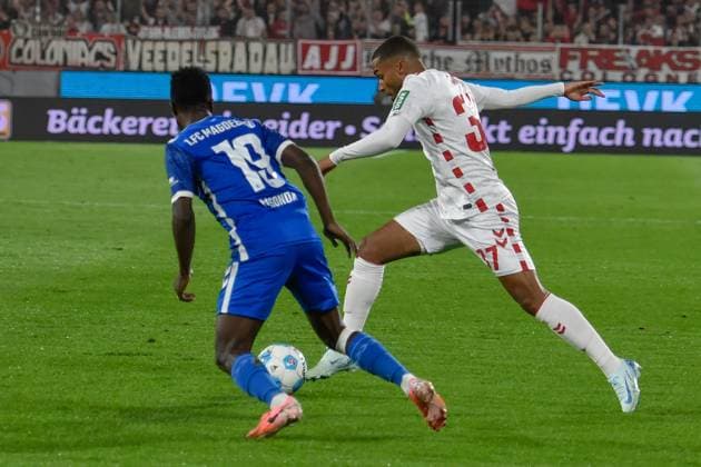 from left in duel Lubambo Musonda Magdeburg 19 Linton Maina Cologne 37 14 09 2024 Soccer 1 FC Cologne vs 1 FC Magdeburg, Rheinenergiestadion, Cologne, DFB DFL REGULATIONS PROHIBIT ANY USE OF PHOTOGRAPHS AS IMAGE SEQUENCES AND OR QUASI VIDEO NRW Germany Copyright: xpepphotox xSaschaxWeizx pep00321, pep_20240914_hm