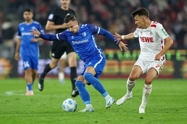 14 09 2024, 2 Fußball Bundesliga, 1 FC Köln 1 FC Magdeburg, RheinEnergieSTADION, Saison 2024 2025 Zweikampf Falko Michel 1 FC Magdeburg 21 vs Dejan Ljubicic 1 FC Köln 7 DFB regulations prohibit any use of photographs as image sequences and or quasi video Nordrhein Westfalen Germany