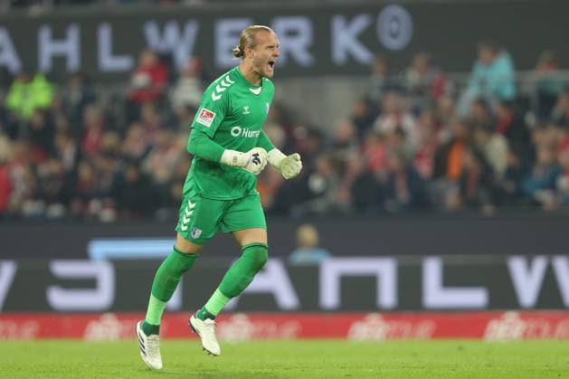 Goalkeeper Dominik Reimann 1 FC Magdeburg celebrates after his team s first goal during the 2 Bundesliga match between 1 FC Köln and 1 FC Magdeburg at RheinEnergieStadion on September 14, 2024 in Cologne, Germany Germany Photo by Oliver Kaelke DeFodi Images Goalkeeper Dominik Reimann 1 FC Magdeburg celebrates after his team s first goal during the 2 Bundesliga match between 1 FC Köln and 1 FC Magdeburg at RheinEnergieStadion on September 14, 2024 in Cologne, Germany Photo by Oliver Kaelke DeFodi Images DFB DFL REGULATIONS PROHIBIT ANY USE OF PHOTOGRAPHS AS IMAGE SEQUENCES AND OR QUASI VIDEO Defodi 678 2024 09 14 OK KOEFCM 1245 Defodi-678 DFB DFL REGULATIONS PROHIBIT ANY USE OF PHOTOGRAPHS AS IMAGE SEQUENCES AND OR QUASI-VIDEO.