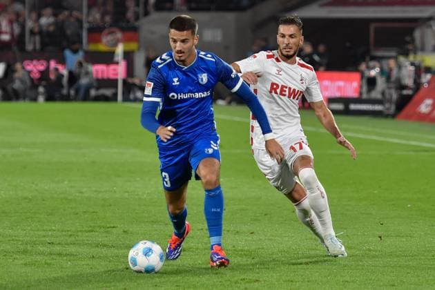 v li in duel Andi Hoti Magdeburg 3 Leart Pacarada Koeln 17 14 09 2024 Soccer 1 FC Koeln vs 1 FC Magdeburg, Rheinenergiestadion, Koeln, DFB DFL REGULATIONS PROHIBIT ANY USE OF PHOTOGRAPHS AS IMAGE SEQUENCES AND OR QUASI VIDEO NRW Germany Copyright: xpepphotox xSaschaxWeizx pep00321, pep_20240914_hm