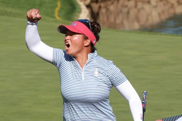GAINESVILLE, VA - SEPTEMBER 14: Team USA golfer Megan Khang reacts to making the putt to win the match on the 14th hole during Saturday Four-Ball during the 2024 Solheim Cup on September 14, 2024 at Robert Trent Jones Golf Club at Gainesville, Virginia. (Photo by Brian Spurlock Icon Sportswire) GOLF: SEP 14 Solheim Cup EDITORIAL USE ONLY Icon24091463