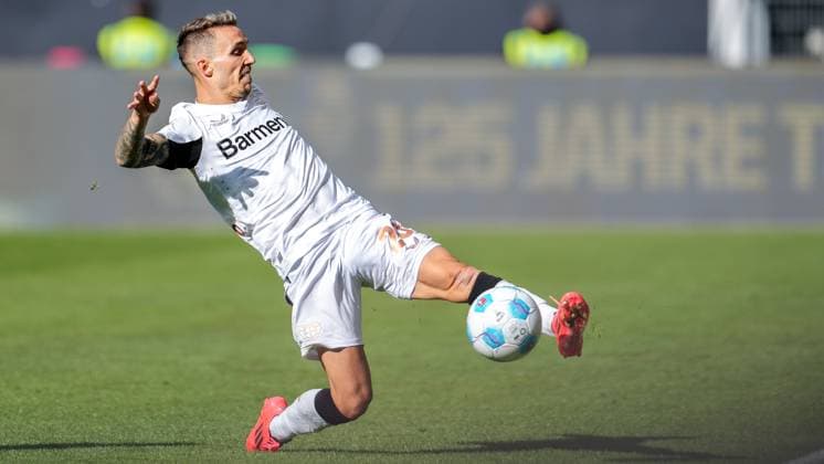 Alejandro Grimaldo B04, 20 , on the ball, cropped, full body, single image, single photo, action, action, 14 09 2024, Sinsheim Germany , Football, Bundesliga, TSG 1899 Hoffenheim Bayer 04 Leverkusen, DFB DFL REGULATIONS PROHIBIT ANY USE OF PHOTOGRAPHS AS IMAGE SEQUENCES AND OR QUASI VIDEO xozx