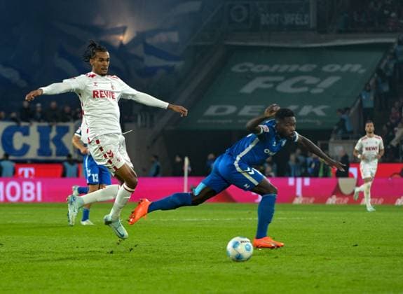 14 09 2024, xjpx, Fussball 2 Bundesliga, 1 FC Koeln 1 FC Magdeburg emspor, v l v l Damion Downs Koeln Daniel Heber Magdeburg DFL DFB REGULATIONS PROHIBIT ANY USE OF PHOTOGRAPHS as IMAGE SEQUENCES and or QUASI VIDEO Koeln