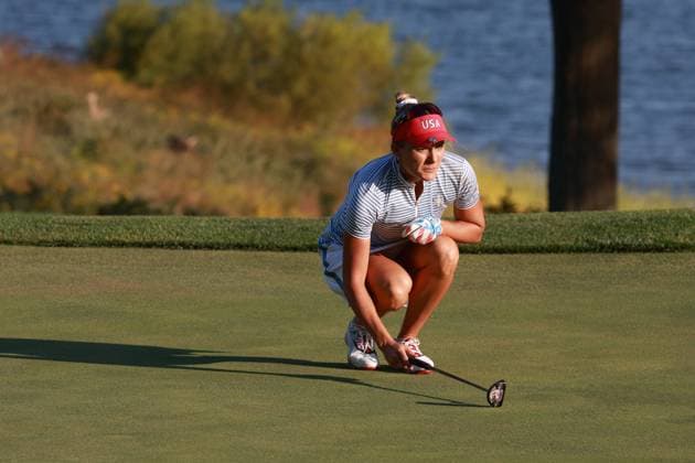 GAINESVILLE, VA - SEPTEMBER 14: Team USA golfer Lexi Thompson lines up her putt on the 17th hole during Saturday Four-Ball during the 2024 Solheim Cup on September 14, 2024 at Robert Trent Jones Golf Club at Gainesville, Virginia. (Photo by Brian Spurlock Icon Sportswire) GOLF: SEP 14 Solheim Cup EDITORIAL USE ONLY Icon24091495