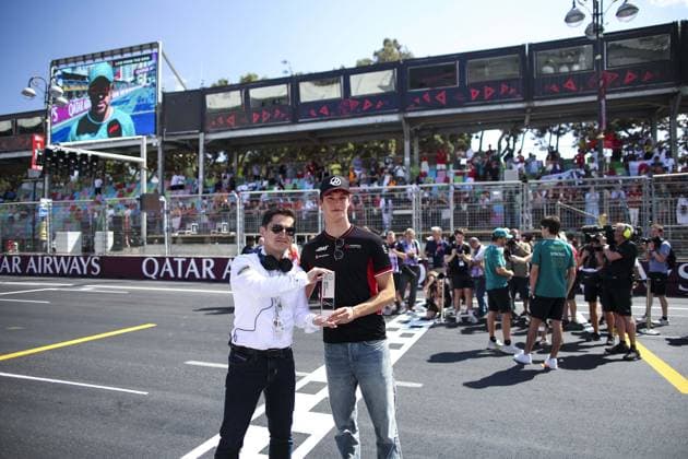 BEARMAN Ollie, Haas F1 Team VF-24 Ferrari, portrait, give the Marshal Trophy Award during the Formula 1 Azerbaijan Grand Prix 2024, 17th round of the 2024 Formula One World Championship, WM, Weltmeisterschaft from September 13 to 15, 2024 on the Baku City Circuit, in Baku, Azerbaijan - F1 - AZERBAIJAN GRAND PRIX 2024 DPPI Panoramic  240915_R17_AZERBAIJAN_DP_EA019524