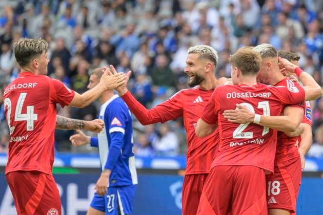 GER, Berlin, Soccer, Hertha BSC vs Fortuna Duesseldorf, 2 Bundesliga, Olympiastadion, 15 09 2024, f l Dawid Kownacki F95 Duesseldorf 24 , Tim Rossmann F95 Duesseldorf 21 , Isak Johannesson F95 Duesseldorf 08 , Nicolas Gavory F95 Duesseldorf 34 , goal to 0 2, Nicolas Gavory F95 Duesseldorf 34 , goal, hit, jubilation, goal celebration, joy, enthusiasm, celebrates, dfl dfb regulations prohibit any use of photographs as image sequences and or quasi video, Copyright: HMBxMedia UwexKoch