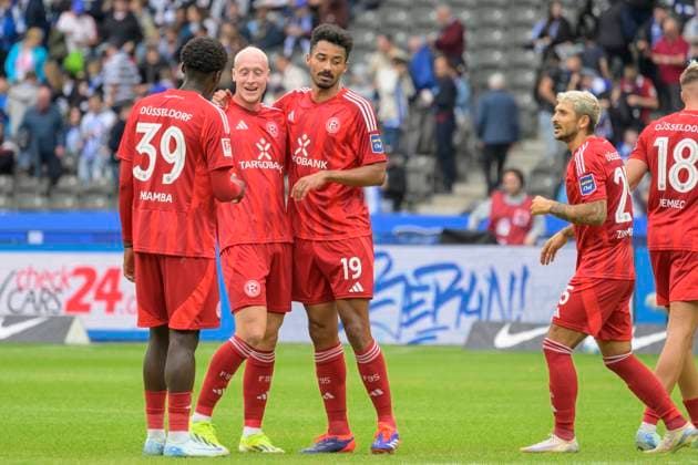 GER, Berlin, Football, Hertha BSC vs Fortuna Duesseldorf, 2 Bundesliga, Olympiastadion, 15 09 2024, v l Noah Mbamba F95 Duesseldorf 39 , Valgeir Lunddal Fridriksson F95 Duesseldorf 12 , Emmanuel Iyoha F95 Duesseldorf 19 , Matthias Zimmermann F95 Duesseldorf 25 , joy, jubilation, final score 0 2, Hertha loses, dfl dfb regulations prohibit any use of photographs as image sequences and or quasi video, Copyright: HMBxMedia UwexKoch