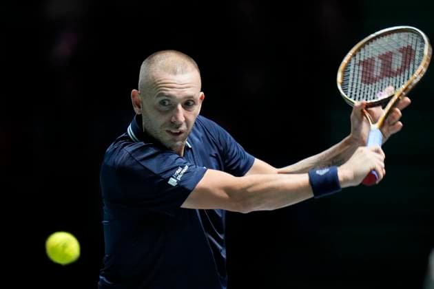 Tennis, Davis Cup, GroÃŸbritannien - Kanada 15th September 2024; AO Arena, Manchester, England; Davis Cup Finals, Group Stage, Group D Day 6; Daniel Evans of Great Britain plays a backhand shot during his match against Denis Shapovalov of Canada  ActionPlus12693167 StevenxFlynn