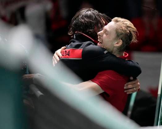 Tennis, Davis Cup, GroÃŸbritannien - Kanada 15th September 2024; AO Arena, Manchester, England; Davis Cup Finals, Group Stage, Group D Day 6; Frank Dancevic, Captain of Canada hugs Denis Shapovalov of Canada after his victory over Daniel Evans of Great Britain took Canada to the Finals of the Davis Cup in Malaga later this year  ActionPlus12693177 StevenxFlynn