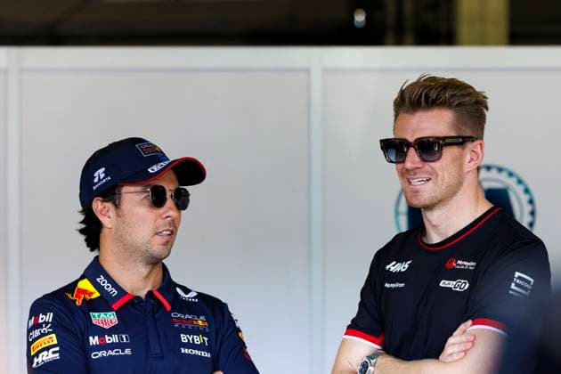 15th September 2024; Baku City Circuit, Baku, Azerbaijan; Formula 1 Azerbaijan Grand Prix 2024; Race Day; Sergio Perez and Nico Hulkenberg chat before the driver parade at the Azerbaijan Formula 1  ActionPlus12693303 StephenxBlackberry