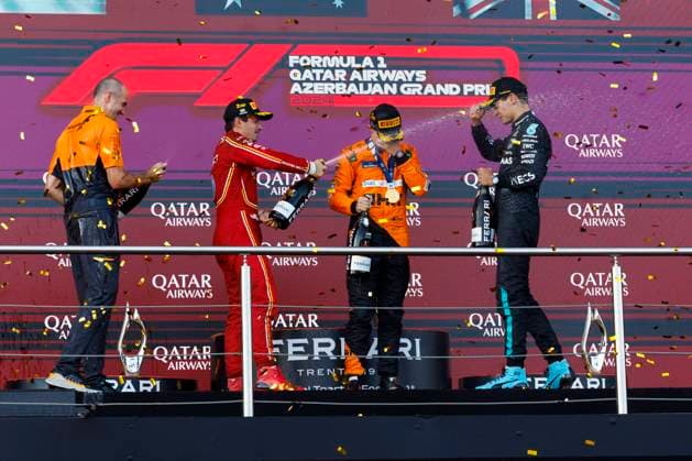15th September 2024; Baku City Circuit, Baku, Azerbaijan; Formula 1 Azerbaijan Grand Prix 2024; Race Day; Charles Leclerc, Oscar Piastri, George Russell celebrates being on the podium after the race at the Azerbaijan Formula 1  ActionPlus12693344 StephenxBlackberry