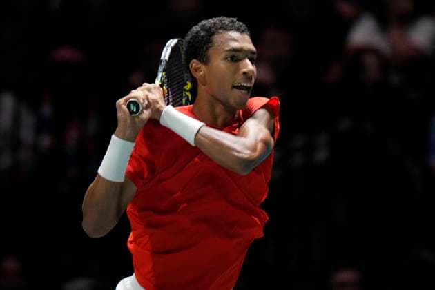 Tennis, Davis Cup, GroÃŸbritannien - Kanada 15th September 2024; AO Arena, Manchester, England; Davis Cup Finals, Group Stage, Group D Day 6; Felix Auger-Aliassime of Canada plays a backhand shot  ActionPlus12693434 StevenxFlynn