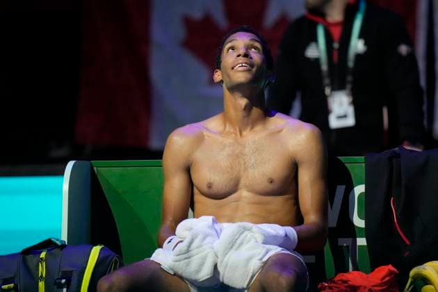 Tennis, Davis Cup, GroÃŸbritannien - Kanada 15th September 2024; AO Arena, Manchester, England; Davis Cup Finals, Group Stage, Group D Day 6; Felix Auger-Aliassime of Canada rests at the end of a game  ActionPlus12693435 StevenxFlynn