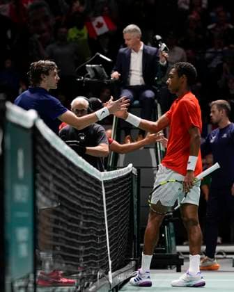Tennis, Davis Cup, GroÃŸbritannien - Kanada 15th September 2024; AO Arena, Manchester, England; Davis Cup Finals, Group Stage, Group D Day 6; Felix Auger-Aliassime of Canada shakes hands with Jack Draper of Great Britain after winning his match 7-6 7-5  ActionPlus12693441 StevenxFlynn