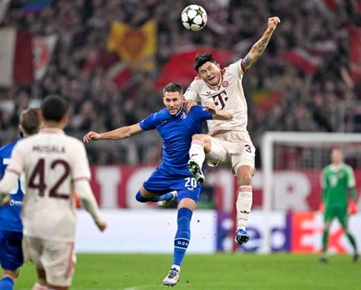 17 09 2024, Football UEFA Championsleague 2024 2025 Matchday 1, FC Bayern Munich Dinamo Zagreb, at Allianz Arena Munich v l Marko Pjaca Dinamo Zagreb v Minjae Kim Bayern Munich DFL and DFB regulations prohibit any use of photographs as image sequences and or quasi video