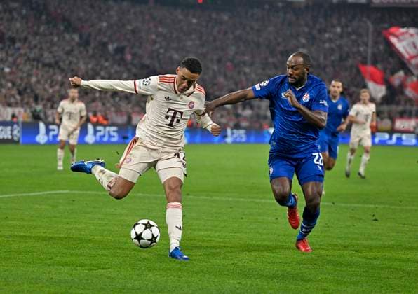 17 09 2024, Football UEFA Championsleague 2024 2025 Matchday 1, FC Bayern Munich Dinamo Zagreb, at Allianz Arena Munich v l Jamal Musiala FC Bayern Munich v Kevin Theophile Catherine Dinamo Zagreb DFL and DFB regulations prohibit any use of photographs as image sequences and or quasi video