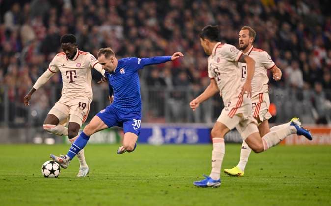 duel, action Alphonso Davies Bayern FC Muenchen FCB 19 vs Marko Rog GNK Dinamo Zagreb 30 Harry Kane FC Bayern Muenchen FCB 09 Min jae Kim FC Bayern Muenchen FCB 03 FC Bayern Muenchen FCB vs GNK Dinamo Zagreb Matchday 1 17 09 2024 DFL REGULATIONS PROHIBIT ANY USE OF PHOTOGRAPHS AS IMAGE SEQUENCES AND OR QUASI VIDEO FC Bayern Muenchen FCB vs GNK Dinamo Zagreb