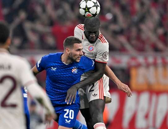 17 09 2024, Football UEFA Championsleague 2024 2025 Matchday 1, FC Bayern Munich Dinamo Zagreb, at Allianz Arena Munich v l Marko Pjaca Dinamo Zagreb v Dayot Upamecano FC Bayern Munich DFL and DFB regulations prohibit any use of photographs as image sequences and or quasi video