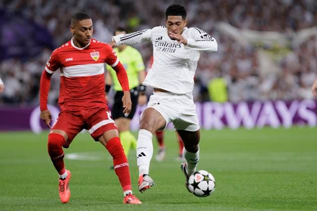 UEFA CHAMPIONS LEAGUE - Real Madrid vs VfB Stuttgart MADRID, SPAIN - SEPTEMBER 17: Jude Bellingham of Real Madrid and Enzo Millot of VfB Stuttgart fight for the ball during the UEFA CHAMPIONS LEAGUE 2024 25 match between Real Madrid and VfB Stuttgart at Santiago Bernabeu Stadium. (Photo by Guillermo Martinez) Madrid Santiago BernabÃ u Stadium Spain Copyright: xGuillermoxMartinezx