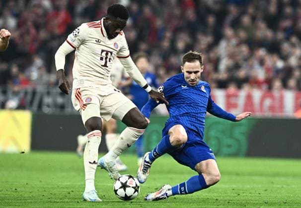 FC Bayern München v GNK Dinamo - UEFA Champions League 2024 25 League Phase MD1 MUNICH, GERMANY - SEPTEMBER 17: Alphonso Davies of Bayern Munich and Marko Rog of Dinamo Zagreb in action during the UEFA Champions League 2024 25 League Phase MD1 match between FC Bayern München and GNK Dinamo at Football Arena Munich on September 17, 2024 in Munich, Germany.  MarkoxLukunic PIXSELL