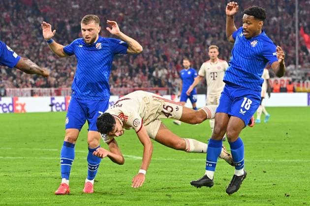 Foul on Aleksandar PAVLOVIC Bayern Muenchen by Luka STOJKOVIC ZNG,l and Ronael Pierre Gabriel GNK , for penalty kick,penalty kick action,tackle Football Champions League , FC Bayern Muenchen GNK Dinamo Zagreb on 17 09 2024, A L L I A N Z A R E N A
