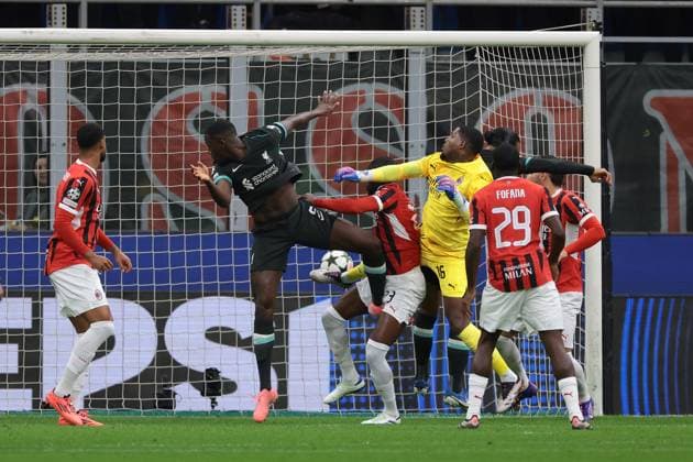 Milan, Italy, 17th September 2024. Ibrahima Konate of Liverpool FC scores to level the game at 1-1 the UEFA Champions League match at Giuseppe Meazza, Milan. Picture credit should read: Jonathan Moscrop Sportimage EDITORIAL USE ONLY. No use with unauthorised audio, video, data, fixture lists, club league logos or live services. Online in-match use limited to 120 images, no video emulation. No use in betting, games or single club league player publications. SPI-3297-0009