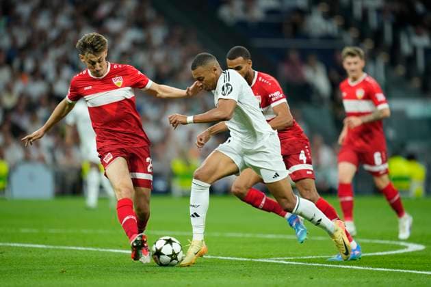 Real Madrid C.F. v VfB Stuttgart - UEFA Champions League 2024 25 League Phase MD1 Kylian Mbappe centre-forward of Real Madrid and France and Anthony Rouault centre-back of Stuttgart and France compete for the ball during the UEFA Champions League 2024 25 League Phase MD1 match between Real Madrid C.F. and VfB Stuttgart at Estadio Santiago Bernabeu on September 17, 2024 in Madrid, Spain. Madrid Spain  Copyright: xJosexBretonx originalFilename:bretonhernandez-realmadr240917_nplPx.jpg
