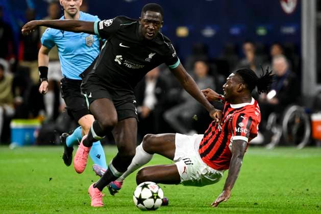 Ibrahima Konate of Liverpool FC and Rafael Leao of AC Milan compete for the ball during the UEFA Champions League 2024 205 football match between AC Milan and Liverpool FC at San Siro stadium in Milano (Italy), September 17, 2024. AndreaxStaccioli