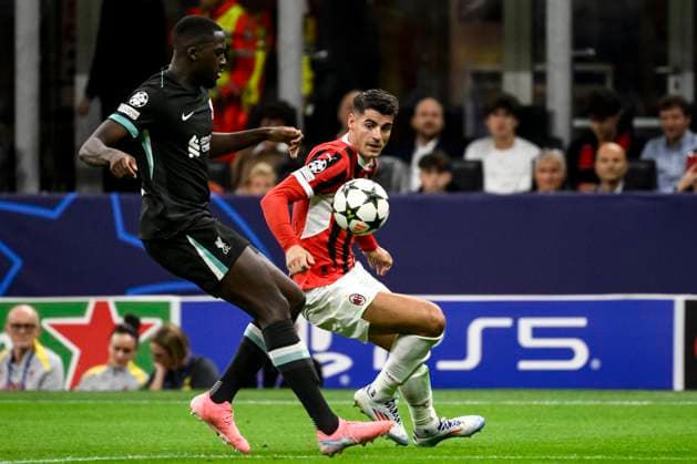 Ibrahima Konate of Liverpool FC and Alvaro Morata of AC Milan compete for the ball during the UEFA Champions League 2024 205 football match between AC Milan and Liverpool FC at San Siro stadium in Milano (Italy), September 17, 2024. AndreaxStaccioli
