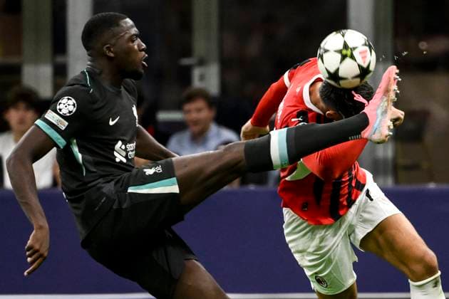 Ibrahima Konate of Liverpool FC and Alvaro Morata of AC Milan compete for the ball during the UEFA Champions League 2024 205 football match between AC Milan and Liverpool FC at San Siro stadium in Milano (Italy), September 17, 2024. AndreaxStaccioli